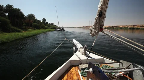 Camera boat - Dahabiya bow and Nile shores, Egypt Stock Footage 35119828