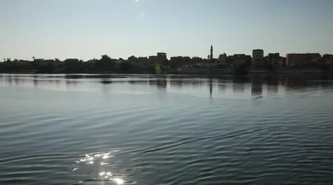 Camera boat Esna city from the Nile River, Egypt Stock Footage 34981633
