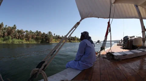 Camera boat - Man looking the Nile river, Egypt Stock Footage 35100561