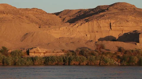 Camera boat - sunset on the rocks, Nile river, Egypt Stock-Footage 35109705