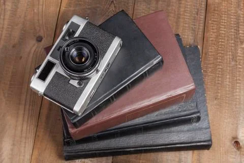 Camera On Books Stock Photos