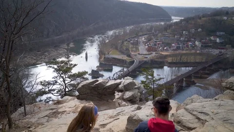 Camera booms down from view of Harpers Ferry National Park to reveal mature Stock Footage 83790252