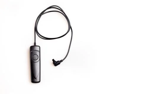 Camera cable remote switch control isolated on white Stock Photos