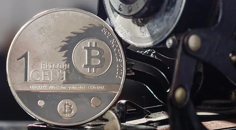 Camera can make money. Concept of Golden bitcoin coins symbolizes elements of Stock Photos