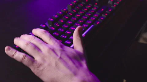 The camera captures the actions of the gamer's hand on the keyboard Stock-Footage 149340519