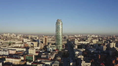 The camera captures the center of a modern metropolis from a drone Stock Footage 149499440