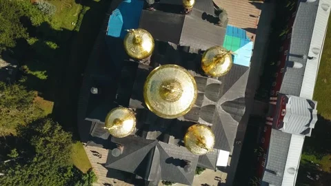 The camera captures a large Orthodox cathedral with golden domes Stock Footage 296486463
