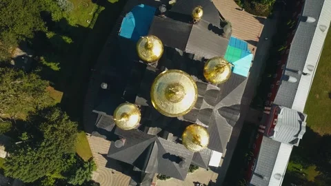 The camera captures a large Orthodox church with golden domes Stock Footage 297717068