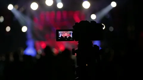 The Camera Captures a Night Rave Techno Party Outdoors with Light Effects Stock Footage 106595760