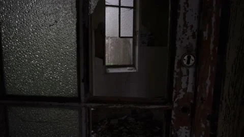 Camera captures the wretched condition of the doors and windows of Stock Footage 164535822