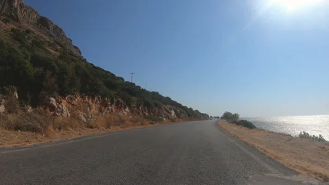 Camera car front pov driving on panoramic road by the sea in Monenvasia, Greece 스톡 동영상 143681035