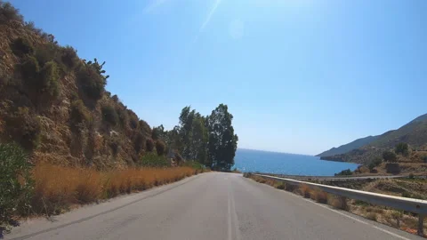Camera car front pov driving on panoramic road by the sea in Mani, Greece Vídeo Stock 236549569