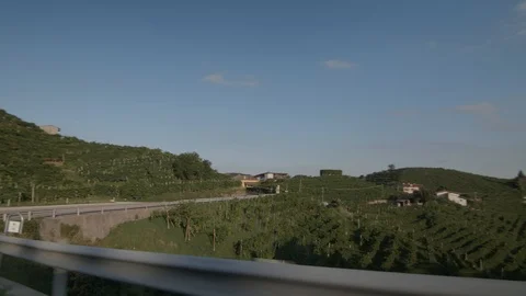 Camera car - view along the prosecco street in Valdobbiadene - 4k Stock Footage 115507866