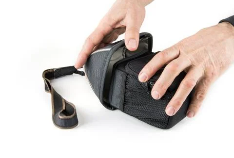 Camera case with a strap in a white Stock Photos