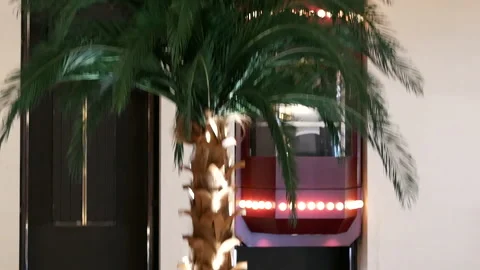 Camera chasing of people taking elevator inside the shopping mall Video stock 102588850