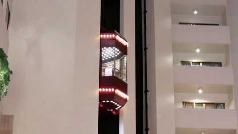 Camera chasing of people taking elevator inside the shopping mall Video stock 103084688