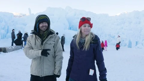 Camera circles around the couple as they walk Video stock 124387894