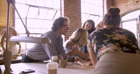 Camera circles around a diverse group of business men and women Stock-Footage 88355809