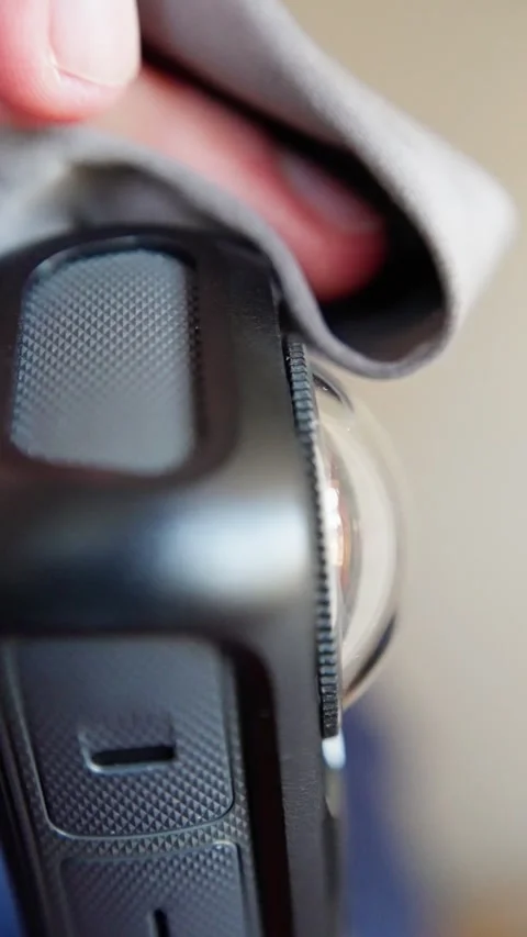 Camera cleaning tutorial, effective microfiber techniques for camera lens and Stock Footage 321761697