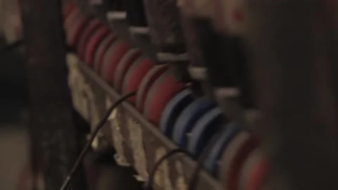 Camera close-up and rack focus of skate wheels on shelf Video stock 232957374