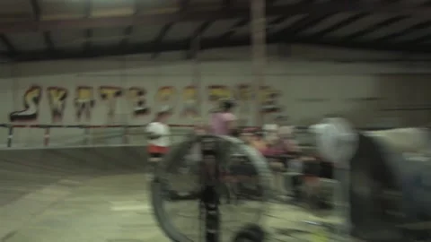 Camera close-up of jammer skating during training, Texas Roller Derby Stock Footage 232957574