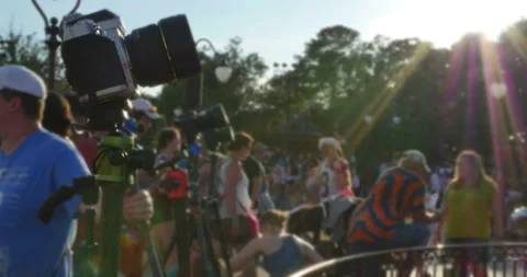 Camera in close up at an outdoor event with crowds of people Stock Footage 152755001