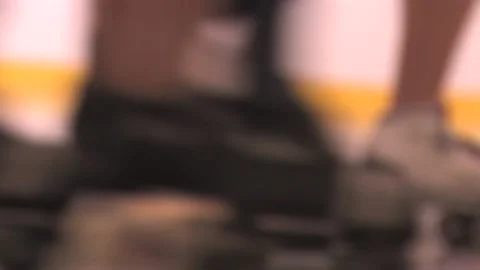 Camera close-up of skates and legs around the track, Texas Roller Girls Stock Footage 232957482