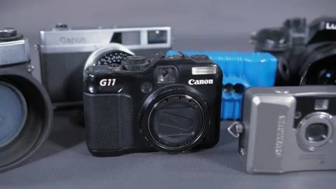 Camera collection on grey background 4k Stock Footage 144808303