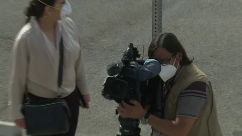 Camera Crew - COVID Masks Video stock 142486520