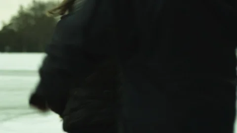 Camera crew run across icy airstrip to interview 01 4/5 Stock Footage 87095942