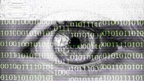 Camera crossing multiple screen tv, eye deforming with binary numbers. LOOP. Stock Footage 117612102