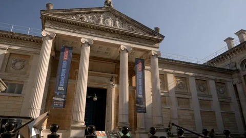 Camera descends from facade of Ashmolean Museum Stock Footage 97432445