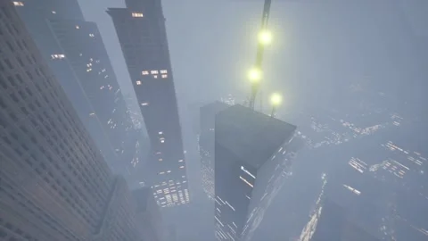 The camera dives from under the clouds between the high-rises of the metropolis Stock Footage 257392430