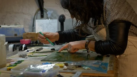 Camera dolly on a glass maker workbench Stock Footage 119476898