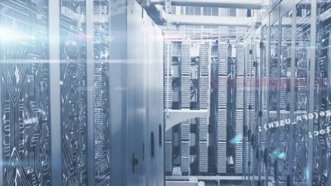 Camera dollying down central aisle of server racks, code overlay intensifying Stock Footage 331213988
