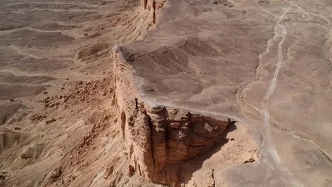 Camera drone descends above Edge of the World Stock Footage 287481789