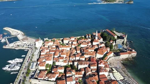 A a camera drone flies ahead above Budva Old Town Stock Footage 249418775