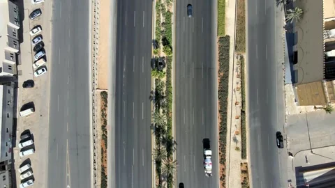 A camera drone flies ahead over Eastern Ring Road, Riyadh Stock Footage 296338993