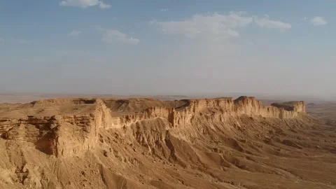 Camera drone flies along the ridge of Jabal Tuwaiq Stock Footage 287481430