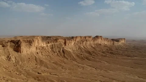 Camera drone flies along the ridge of Jabal Tuwaiq Stock Footage 287481762