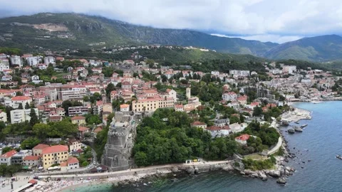 A camera drone flies around Herceg Novi and the Old Town Stock Footage 249422004