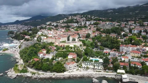 A camera drone flies around Herceg Novi and the Old Town Stock Footage 249422187