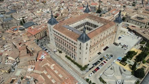 A camera drone flies around over the Alcázar of Toledo Stock Footage 202073073