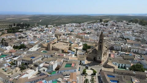 A camera drone flies around over Bujalance Stock Footage 202600536