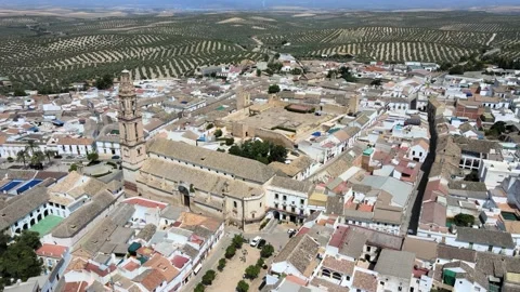 A camera drone flies around over Bujalance Stock Footage 202600630