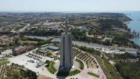 A camera drone flies around the Sanctuary of Christ the King in Lisbon Stock Footage 202016516