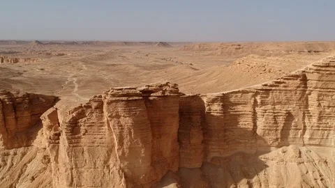 Camera drone flies backwards over Edge of the World Stock Footage 287481676