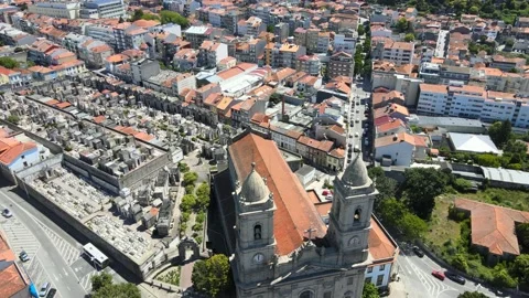 A camera drone flies forward over the Church of Our Lady of Lapa Stock Footage 202060628