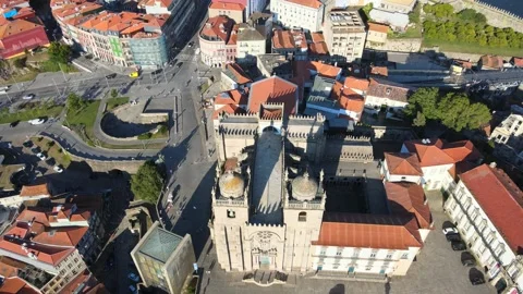 A camera drone flies forward over the Porto Cathedral Stock Footage 202061349