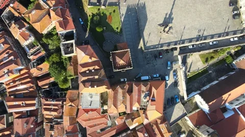 A camera drone flies forward over Porto Cathedral Stock Footage 202061528
